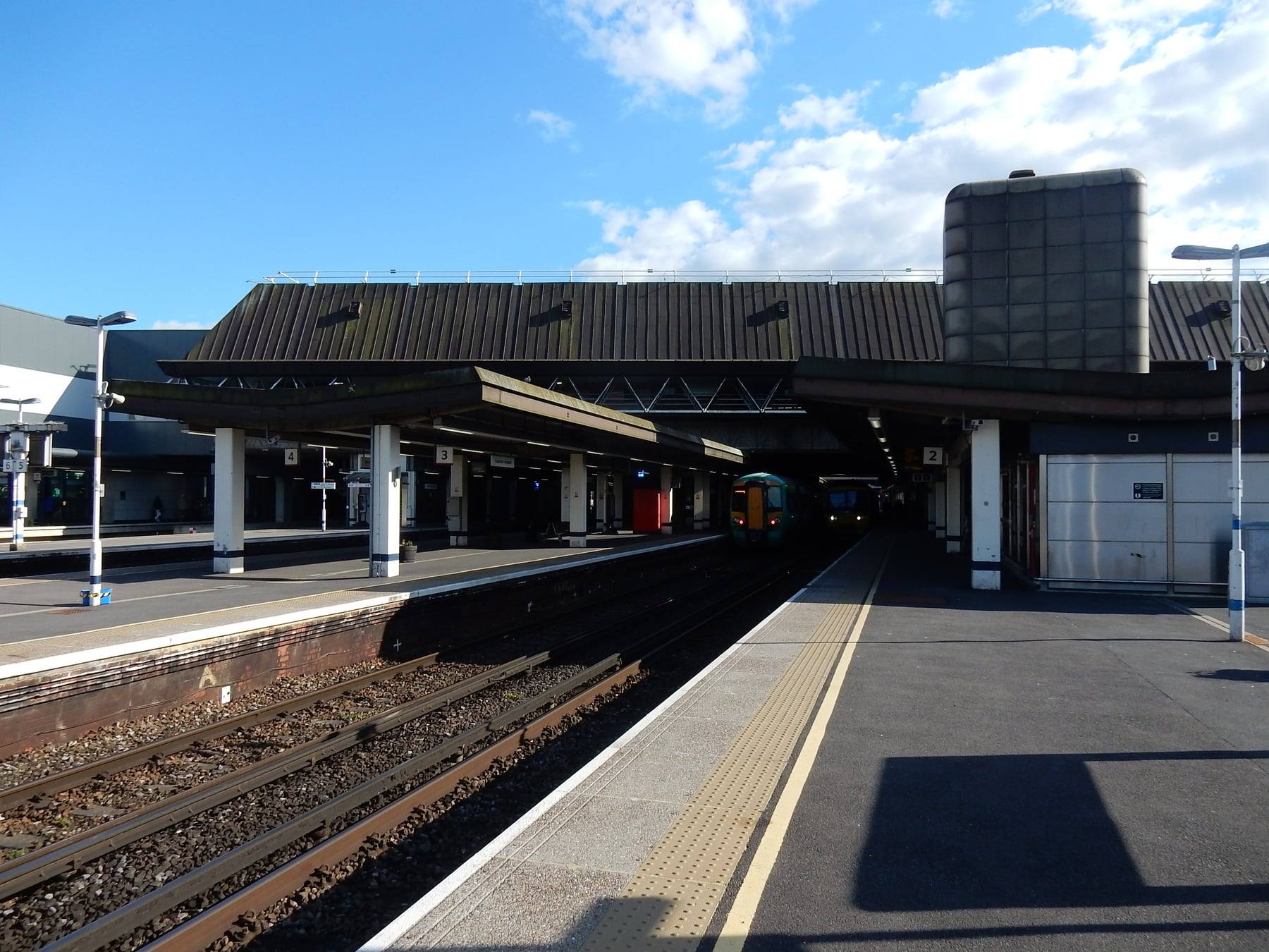 Platforms under the canopy at Gatwick Airport railway station, where trains to Gatwick arrive
