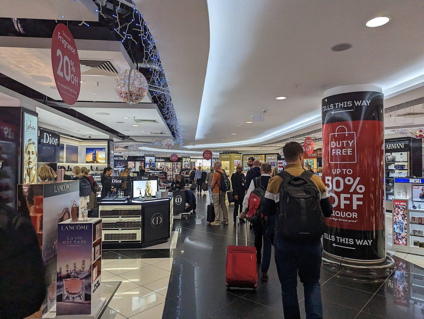 Shoppers passing the shops in Gatwick Airport's North Terminal